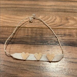 Elegant Heart Bracelet in Cream and Gold